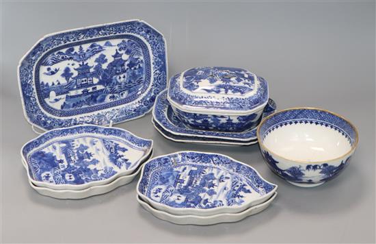 Four Chinese blue and white leaf-shaped plates, three matching rectangular serving dishes and a sauce tureen and cover (faults)